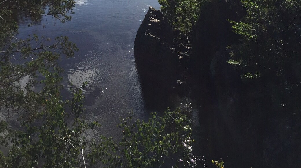 The Taylors Falls Princess docked just below Interstate Park in Taylors Falls. This view is from the glacial potholes trail. You can take a ride through the St. Croix River dalles and on down this peaceful river on one of two paddlewheels that leave from a spur on the parking lot at the potholes.