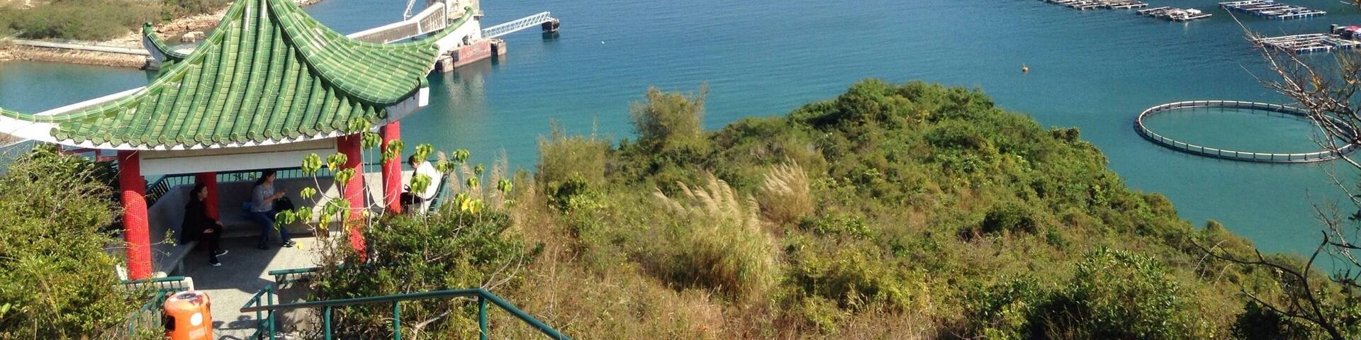 It's a lovely walk from the ferry terminal in the north on Lamma Island at Yung Shue Wan through to the ferry terminal across the other side at Sok Kwu Wan, where you can then head back to HK. There are hills, so be prepared. It makes a glorious half day trip out from the main ferry terminals on Hong Kong island.
http://www.nomadgirl.co/lamma-island-hong-kong/