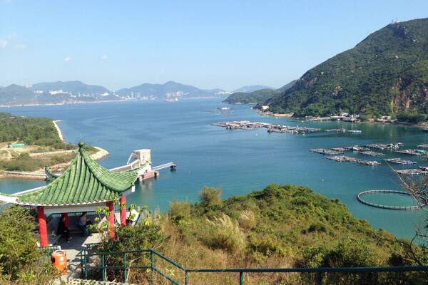 It's a lovely walk from the ferry terminal in the north on Lamma Island at Yung Shue Wan through to the ferry terminal across the other side at Sok Kwu Wan, where you can then head back to HK. There are hills, so be prepared. It makes a glorious half day trip out from the main ferry terminals on Hong Kong island.
http://www.nomadgirl.co/lamma-island-hong-kong/