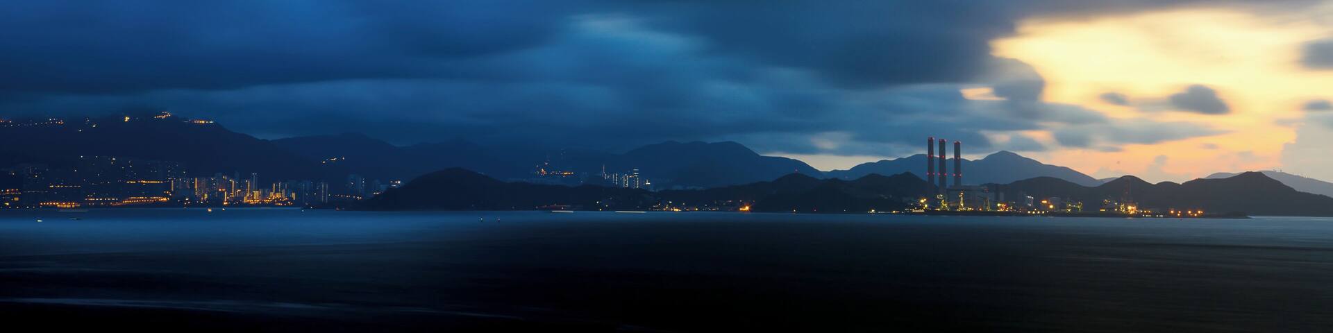 We woke up before 4am and walked through some dark narrow paths and uphill climbs, past houses with their residents still asleep, just to get to this lookout point in Cheung Chau Island's Mini Great Wall. As we got there, rain clouds were starting to form - looming over the islands of Hong Kong with its bright lights, and Lamma with the towering power plant structures, - creating this dramatic morning scene. It was definitely well worth the arduous hike.