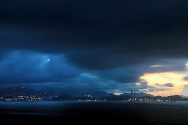 We woke up before 4am and walked through some dark narrow paths and uphill climbs, past houses with their residents still asleep, just to get to this lookout point in Cheung Chau Island's Mini Great Wall. As we got there, rain clouds were starting to form - looming over the islands of Hong Kong with its bright lights, and Lamma with the towering power plant structures, - creating this dramatic morning scene. It was definitely well worth the arduous hike.