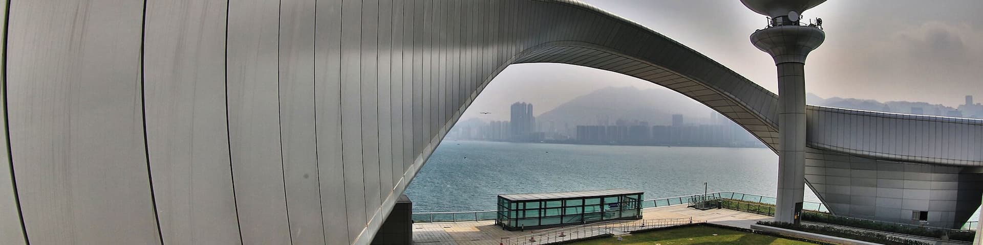 Built on the runway of the former Kai Tak Airport, the Kai Tak Cruise Terminal is an iconic structure centrally located in Hong Kong’s. The terminal is just opened in 2014 and its shops and restaurants open 365 days, and include travel retail, a wedding registry, and a 960-seat dim sum restaurant, Hong Kong cafe, Continental cuisine, Western cafe, and a wine and champagne bar.On the roof of the Terminal, there is a Park which occupies an area of 23,000 square metres with passive amenities including a central lawn, a viewing platform, water garden, fountain plaza, etc. It is a new place with modern facilities which worth to visit when travelling Hong Kong via Cruise or other means. #architecture