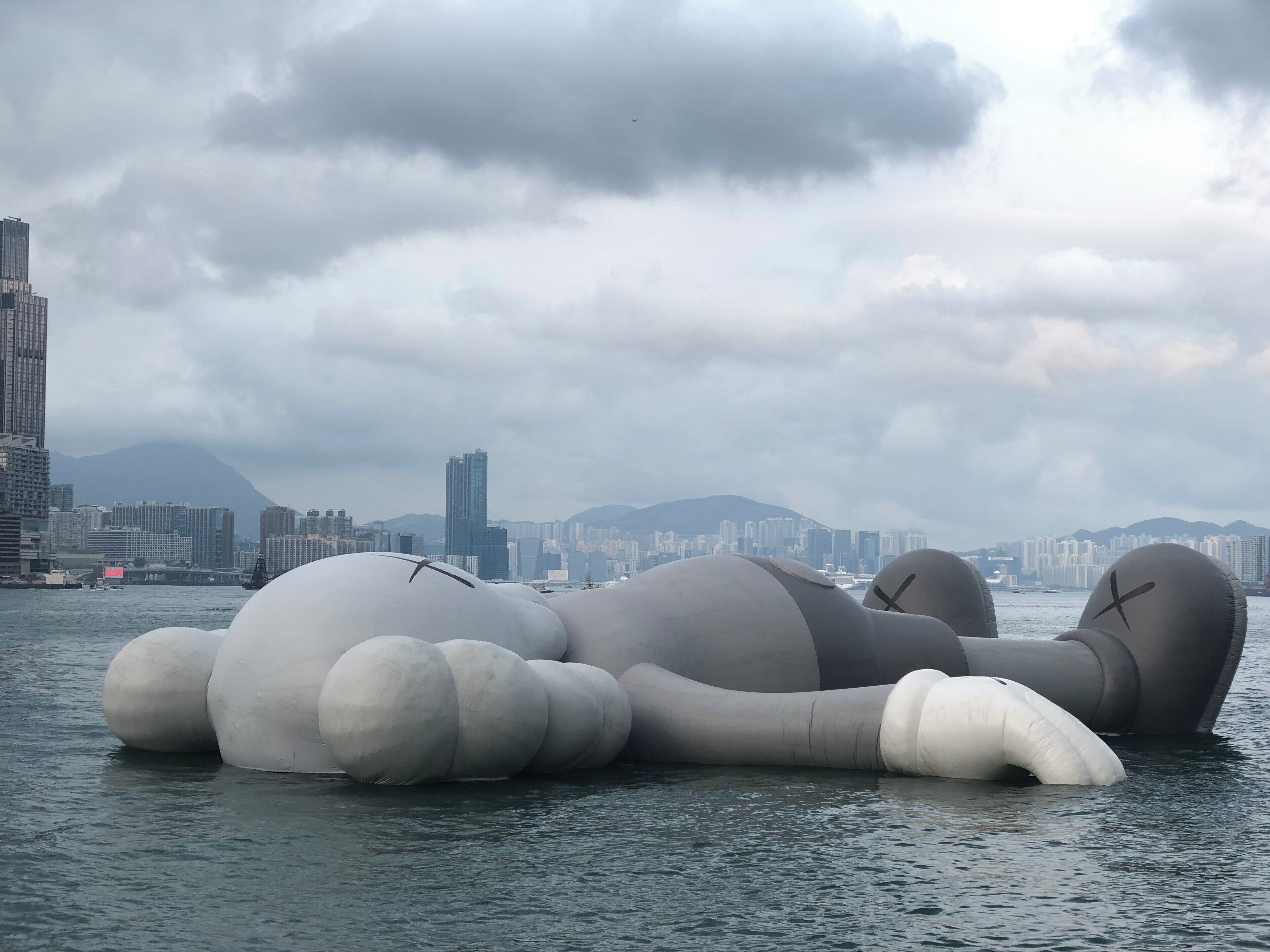 Kaws On Holiday in HongKong... what an idle way to float in the waters and chill out at the Victoria Harbour!