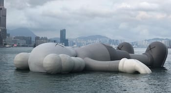 Kaws On Holiday in HongKong... what an idle way to float in the waters and chill out at the Victoria Harbour!