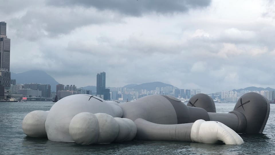 Kaws On Holiday in HongKong... what an idle way to float in the waters and chill out at the Victoria Harbour!