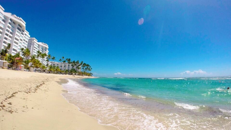 Beautiful beach in Juan Dolio, Dominican Republic! Just an hour and half outside of Santo Domingo. It is a big beach with lots of space and good swimming. Lots of places to eat around the corner. Loved it!