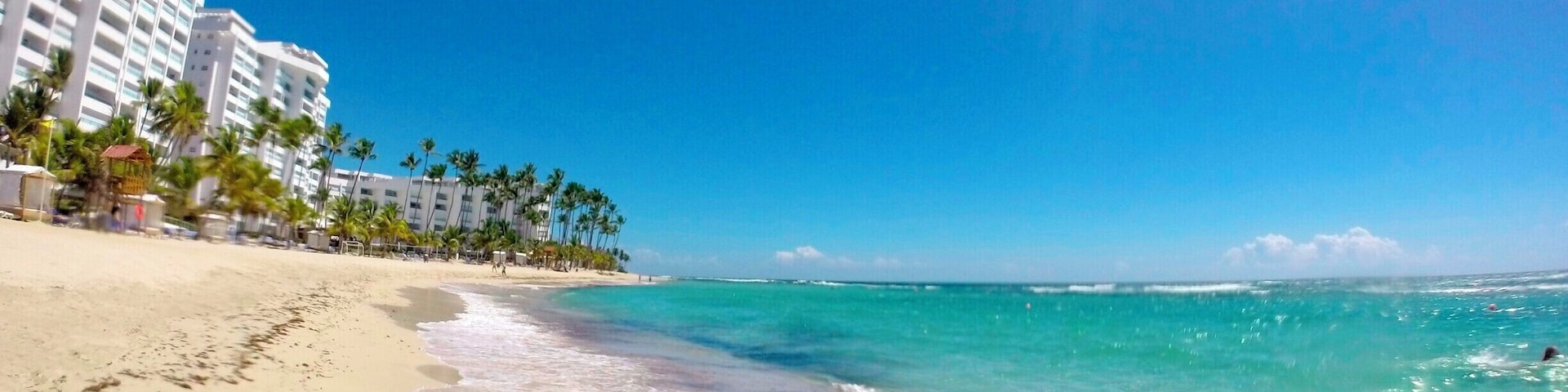 Beautiful beach in Juan Dolio, Dominican Republic! Just an hour and half outside of Santo Domingo. It is a big beach with lots of space and good swimming. Lots of places to eat around the corner. Loved it!