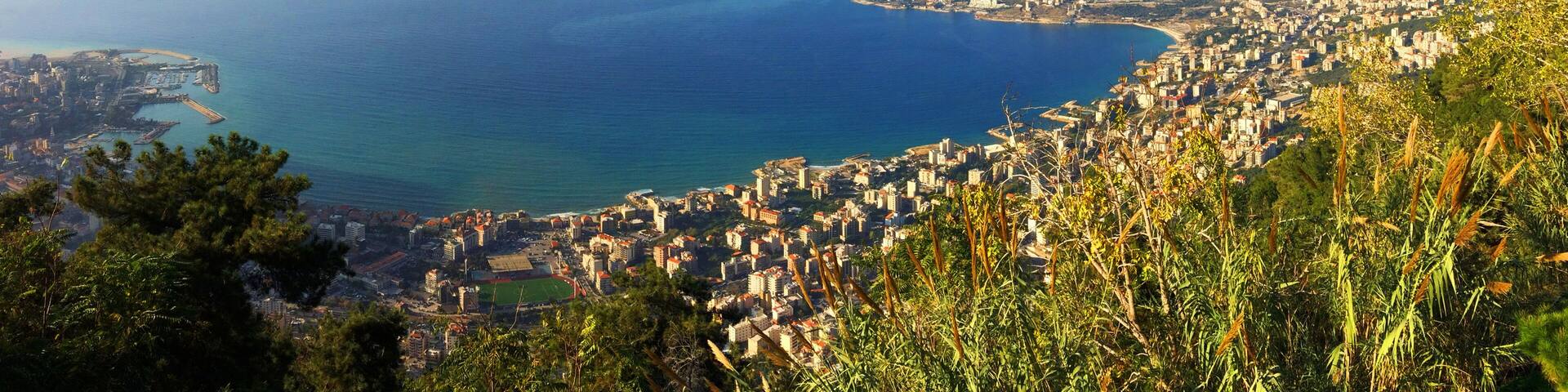 View of Jounieh bay with tiny paragliders flying about
