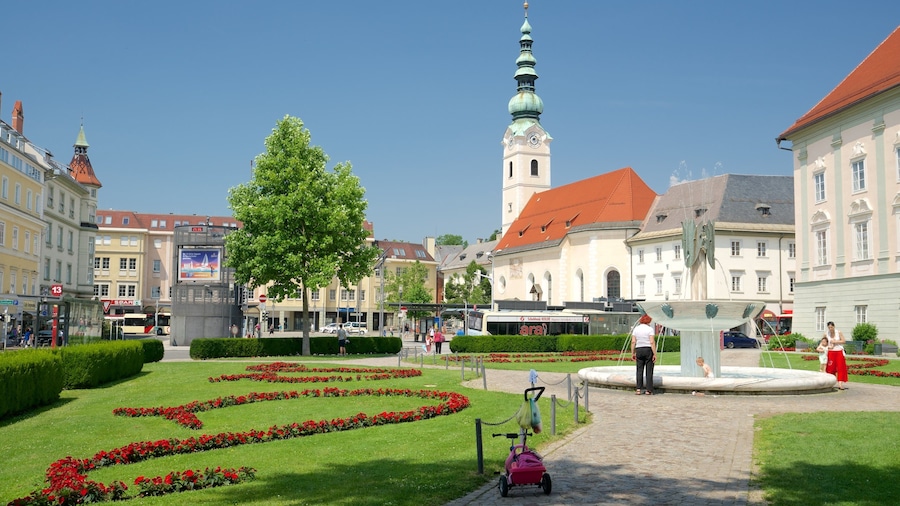 Klagenfurt am Woerthersee which includes a garden, a fountain and heritage elements