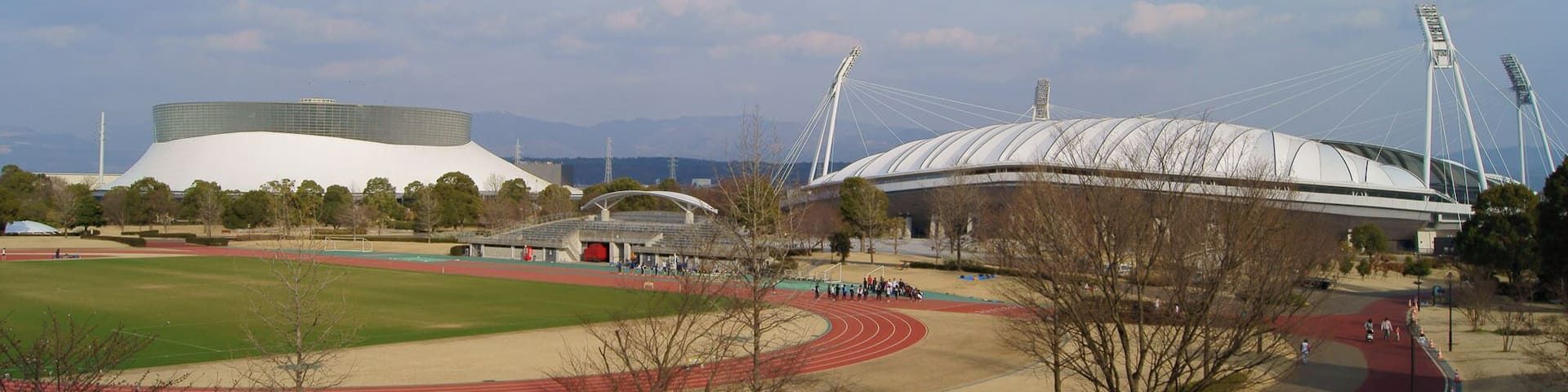 (right to left) Main stadium aka KKWING, supplemental track, the Park Dome of Kumamoto prefectural sports park, Japan.