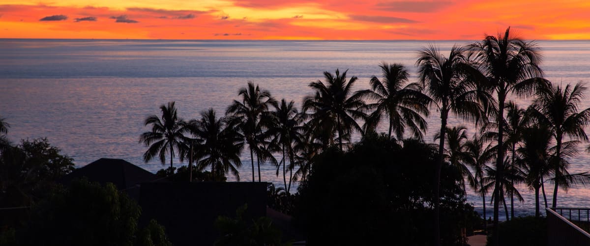Kailua-Kona showing tropical scenes, general coastal views and a sunset