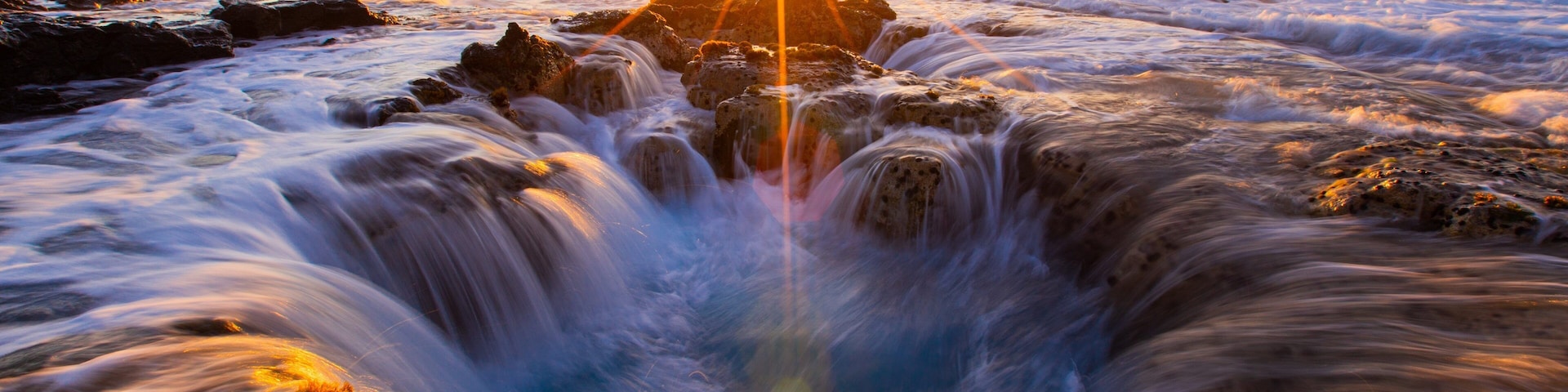 Kailua-Kona showing rugged coastline, a sunset and general coastal views