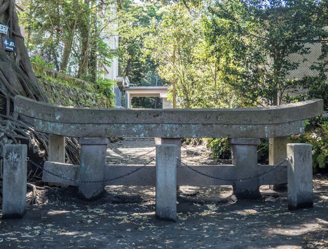 A three meter high tori gate on Sakurajima was completely buried by ash and pumice stone during a volcanic eruption which occurred in 1914.  Rediscovered by builders doing excavation work while building a new school,  it was left  partially buried as a memorial. 
Lava flows from the same eruption joined the then island of Sakurajima to Kyushu.