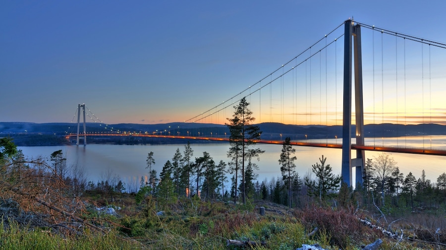 Kramfors which includes night scenes, a bridge and a river or creek