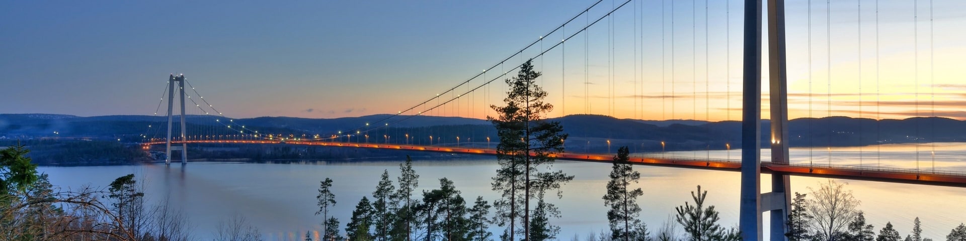 Kramfors which includes night scenes, a bridge and a river or creek