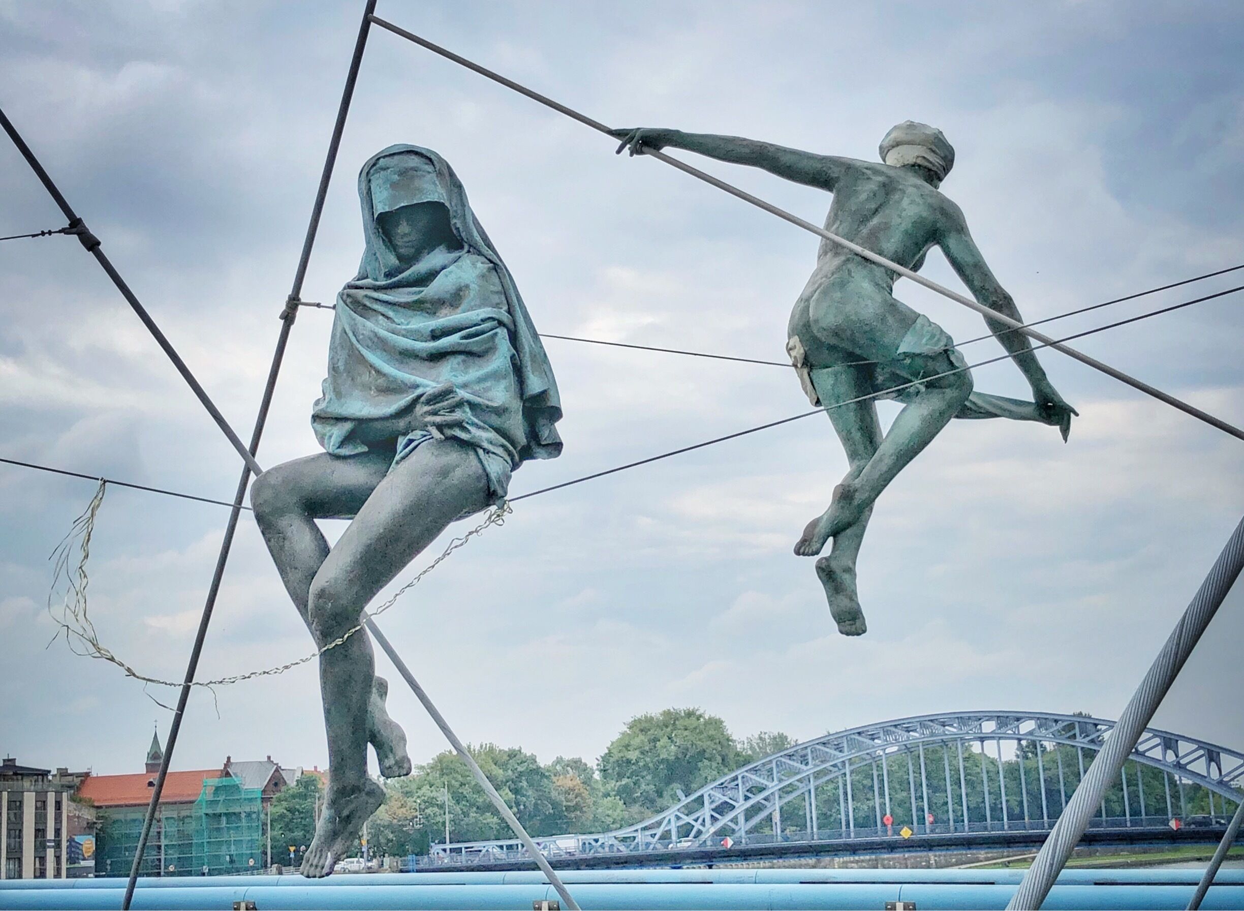 Beautiful modern footbridge/ cycle bridge- great to walk along and see the beautiful gymnastic posed sculptures- very different