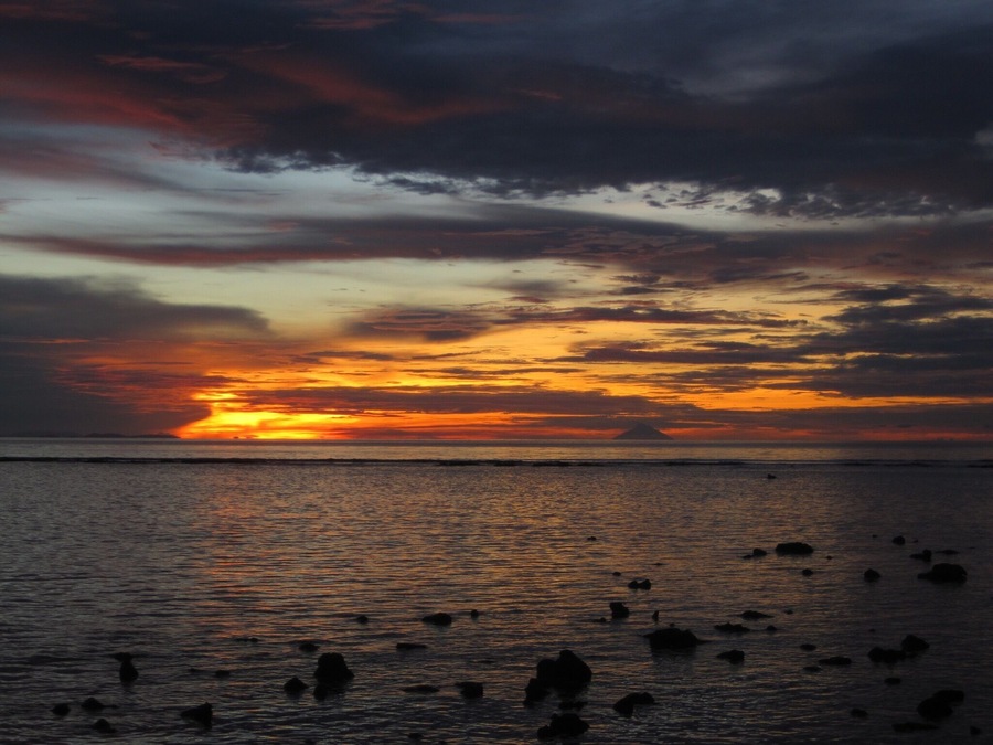Sunset off the coast of Kar Kar Island in the Bismarck Sea, Papua New Guinea.