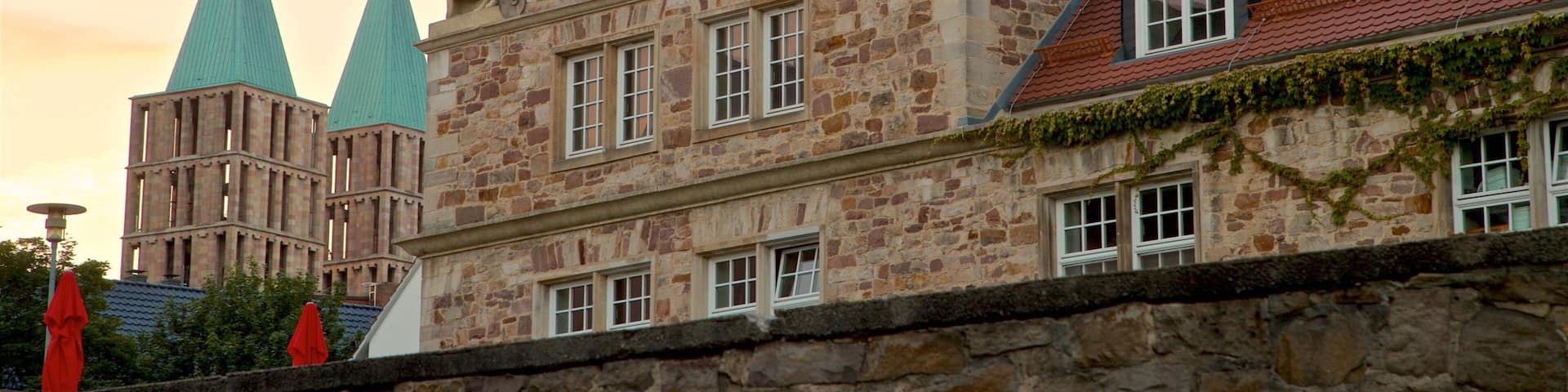 Kassel featuring heritage architecture and a sunset