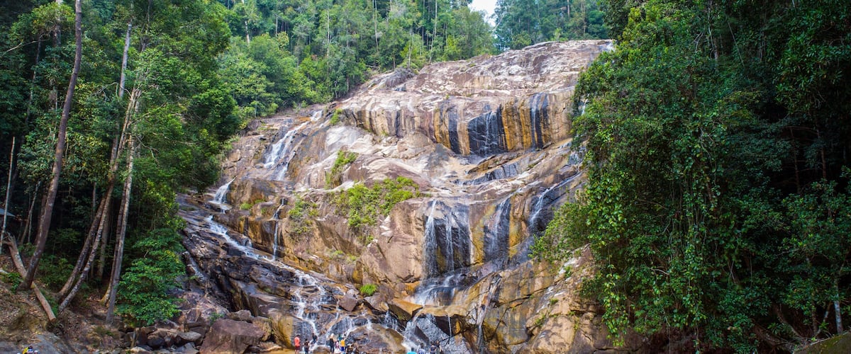 Kuantan which includes forest scenes, a cascade and a river or creek
