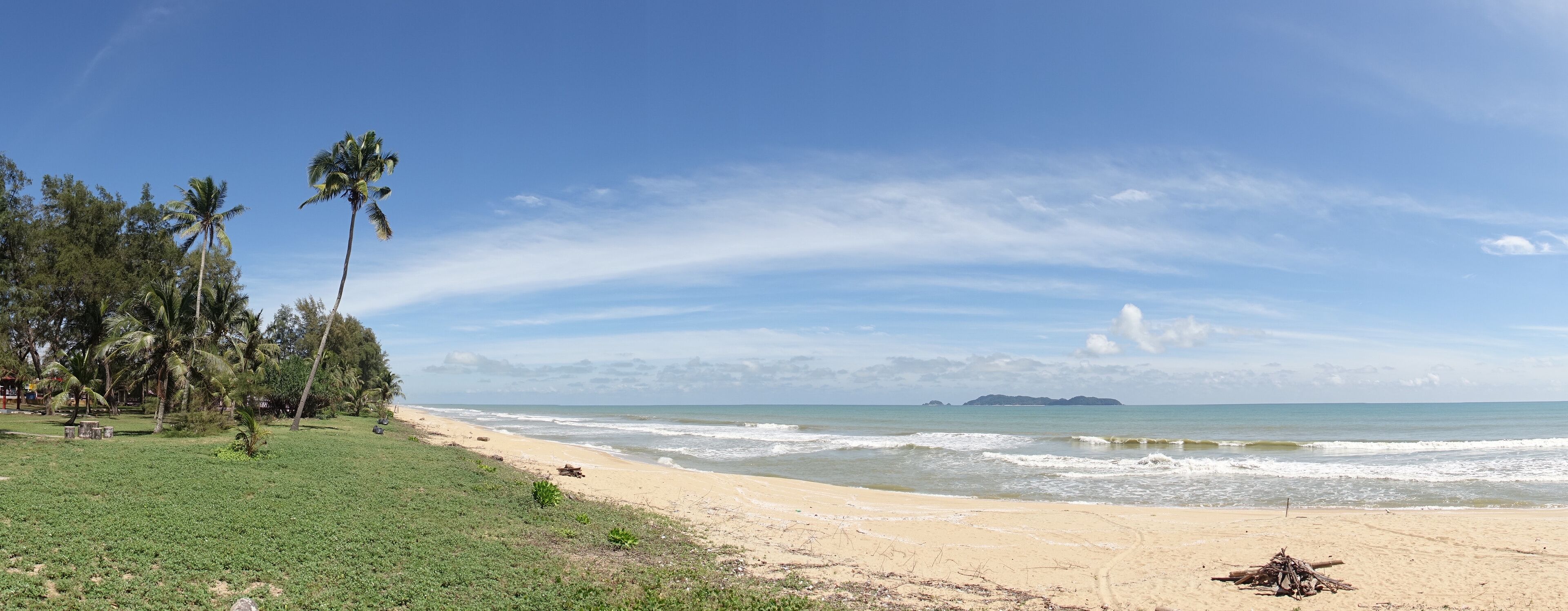Teluk Cempedak Beach with Palm Trees near Pahang in Malaysia, Southeast Asia.
