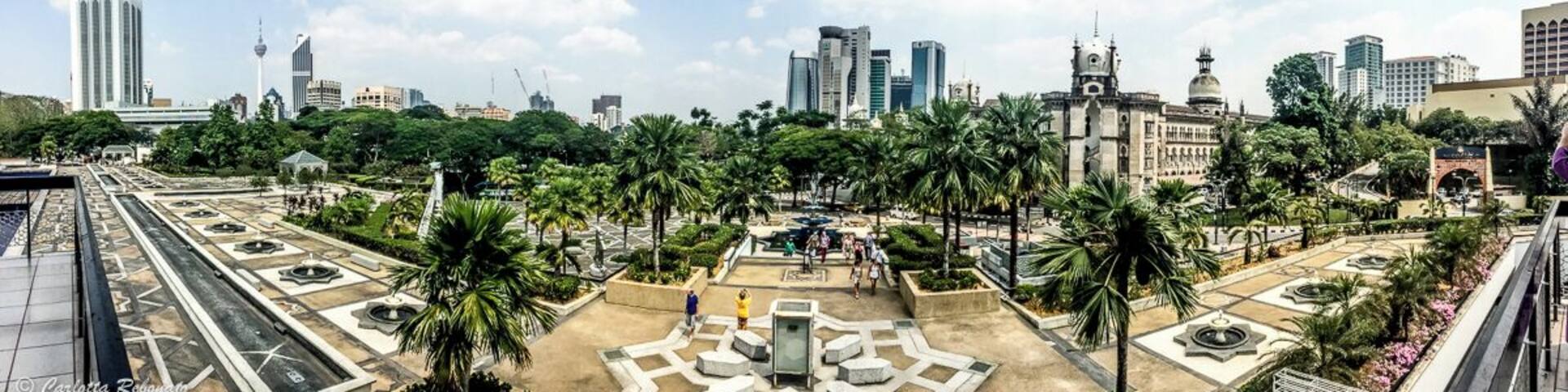 My favorite thing about the National Mosque in Kuala Lumpur? The View! I love this mix between the older Railway Station Administration building, the newer skyscrapers, and the green of the palms. Perfect combination!