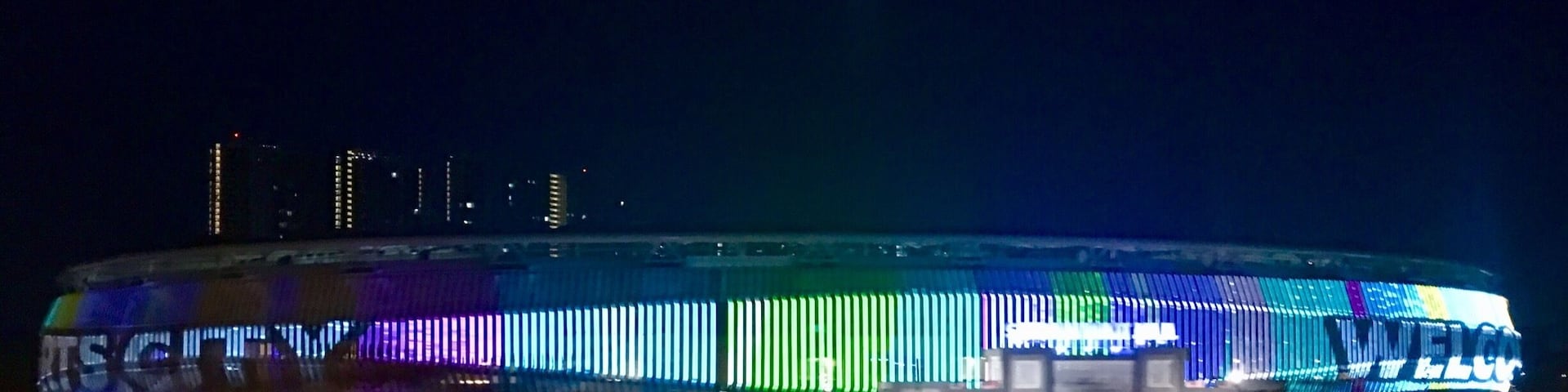 The playful display of colourful LED lights illuminate KL Sports City as the full moon illuminates the sky above it. #klsportscity.my #stadium_bukitjalil #dusk #led display #led #kualalumpur #malaysia #travelblogger #mariadasstheworld