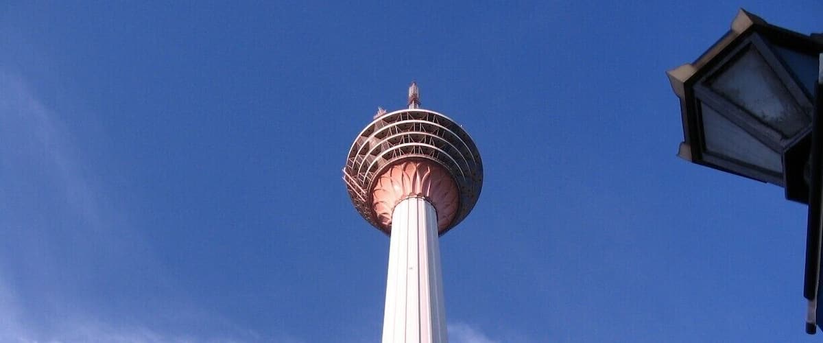 The Kuala Lumpur Tower is a tall tower located in Kuala Lumpur, Malaysia. Its construction was completed on 1 March 1995. It is used for communication purposes and features an antenna that reaches 421 metres. The roof of the pod is at 335 metres