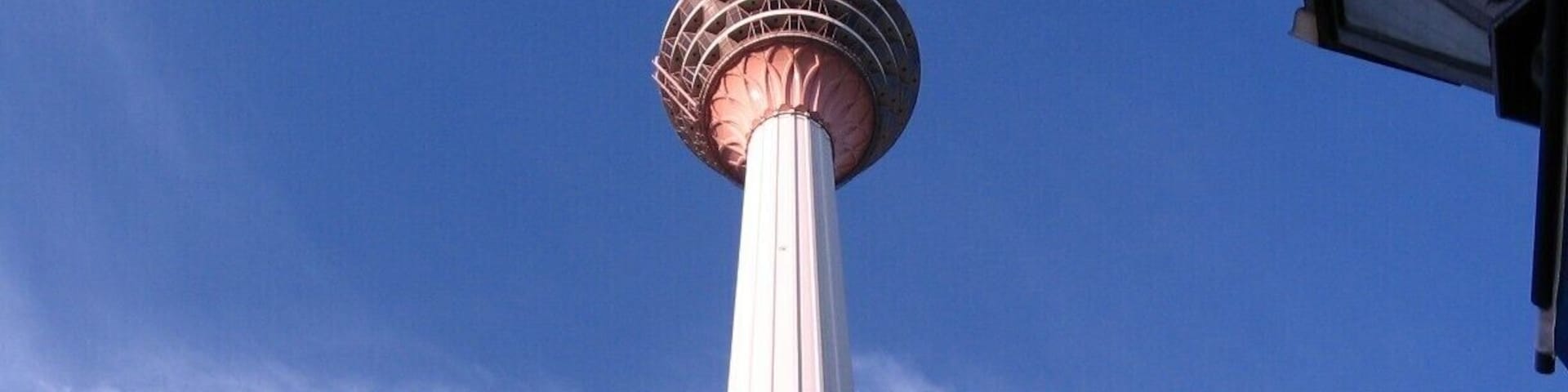 The Kuala Lumpur Tower is a tall tower located in Kuala Lumpur, Malaysia. Its construction was completed on 1 March 1995. It is used for communication purposes and features an antenna that reaches 421 metres. The roof of the pod is at 335 metres