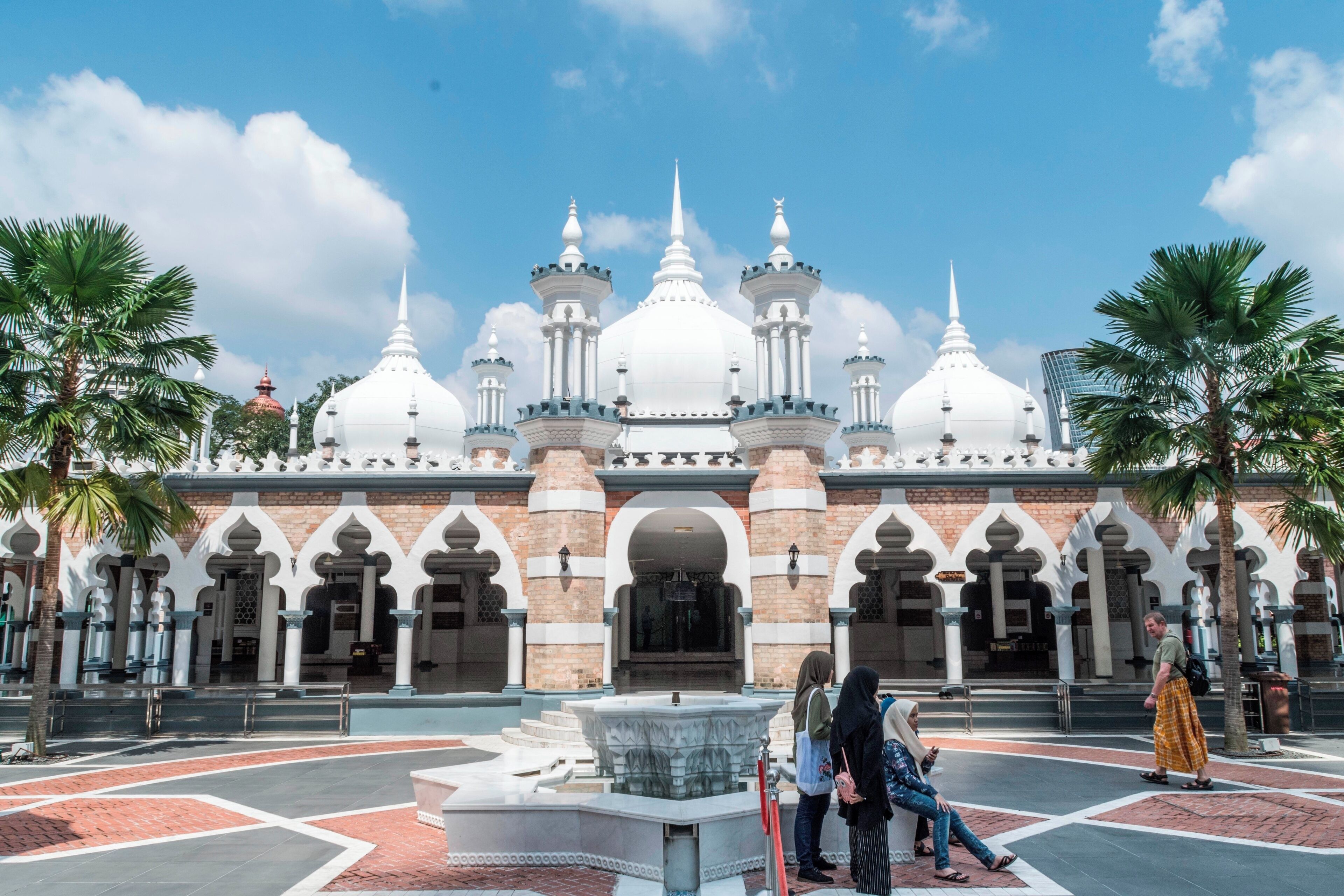 Masjid Jamek Sultan Abdul Samad is a beautiful mosque in Kuala Lumpur.
From Wikipedia - 'The mosque was built on the location of an old Malay burial place at the confluence of Klang and Gombak River. It was the first large mosque to be built in Kuala Lumpur. The foundation stone of the mosque was laid by the Sultan of Selangor, Sultan Sir Alaeddin Sulaiman Shah on 23 March 1908, and the Sultan officially opened the mosque on 23 December 1909.[7][8] The architect was Arthur Benison Hubback who designed the mosque in the Indian Muslim Mughal architectural style. It served as Kuala Lumpur's main mosque until the national mosque, Masjid Negara, was built in 1965.'#Mosque #Malaysia #Kuala Lumur #Masjid Jamek