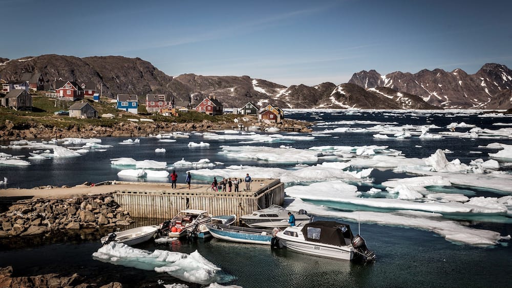 Kulusuk featuring a lake or waterhole, snow and boating