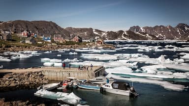 Kulusuk featuring a lake or waterhole, snow and boating