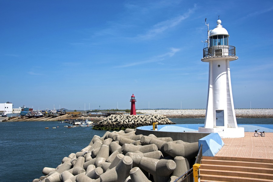 Two lighthouses in a small harbor in Gunsan, South Korea