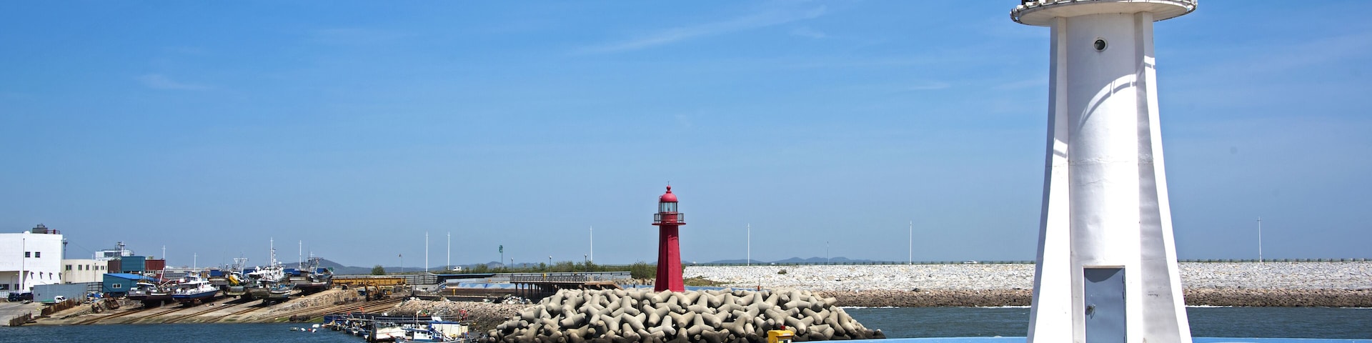 Two lighthouses in a small harbor in Gunsan, South Korea