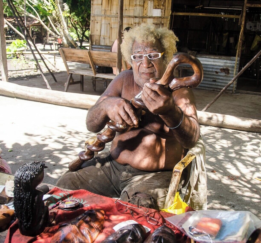 Bruno is a master carver in a small village near Kavieng. We had reading glasses and he choose these to use.