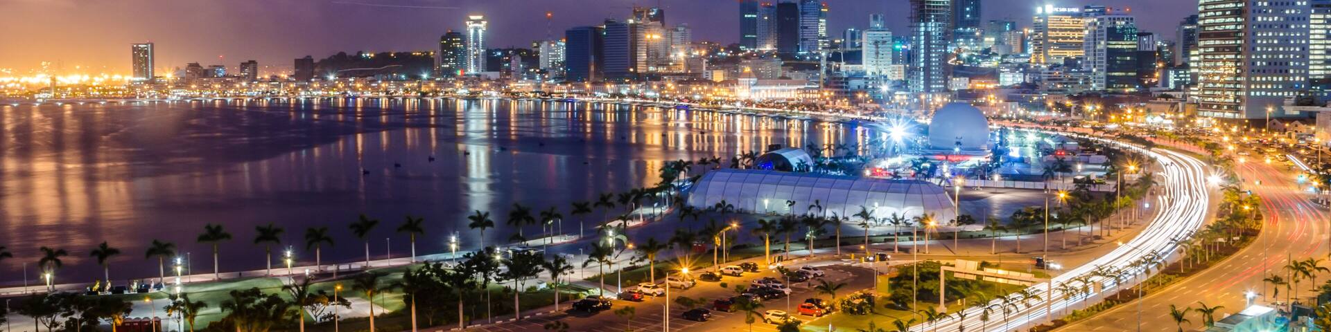 Skyline of capital city Luanda, Luanda bay and seaside promenade with highway during afternoon, Angola, Africa