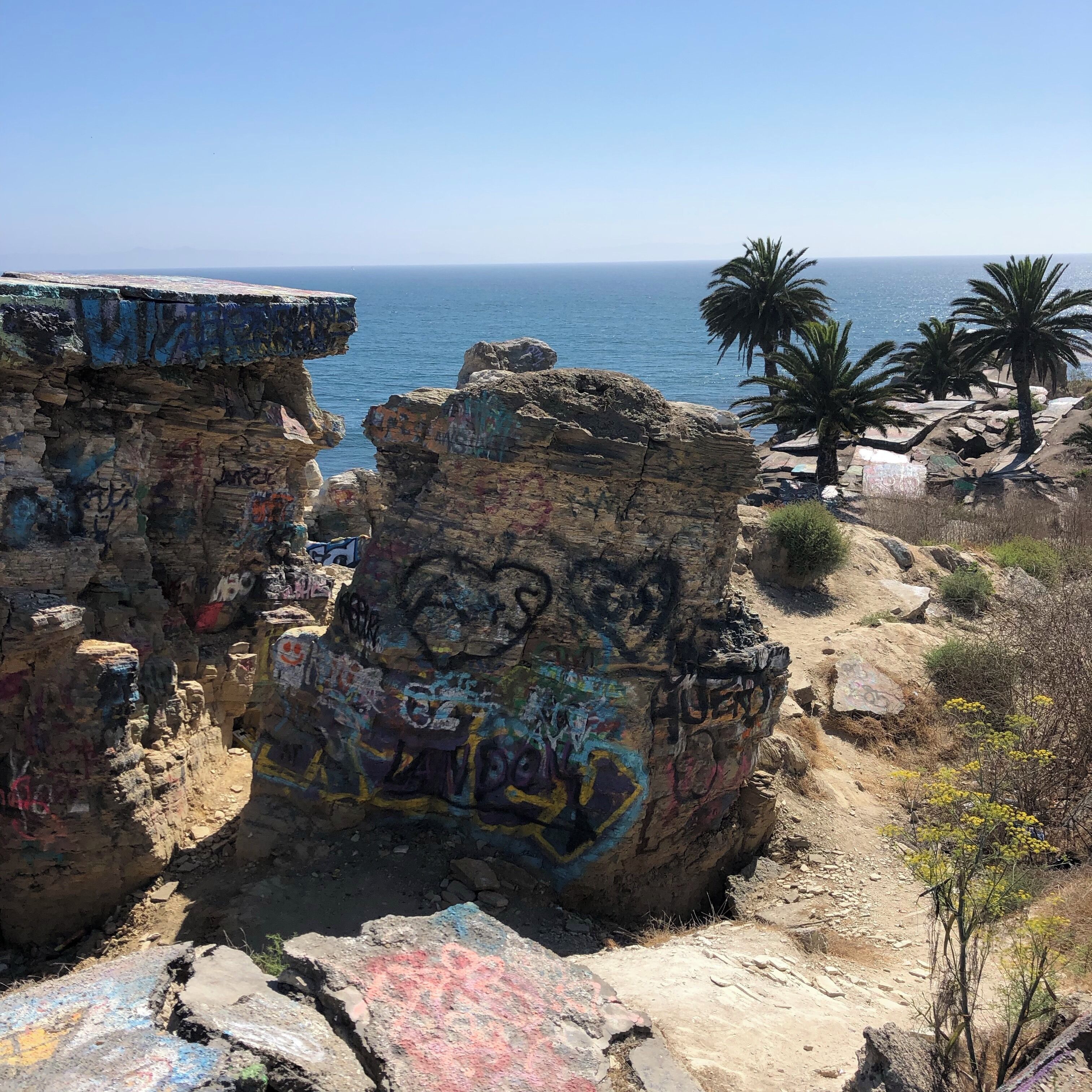 This is the remnants of a 1920’s cliff collapse in the southern part of LA which took with it multiple houses and part of a road. You’ll have to jump a barrier, crawl under the fence on the side of a cliff, and possibly pay a $400 fine (if you’re caught). It’s worth the risk to see this amazing, unique, and slightly apocalyptic feeling place that not many people know about. 
#Adventure #StreetArt #Graffiti #Ruins #Apocalyptic #LA #LosAngles #Ocean #History #Historical #Roadtrip #USA