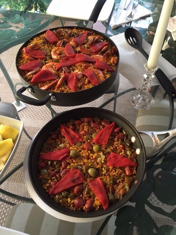 The paella King cooking a couple of Paellas, check out menu at www.thepaellaking.com 
#Deliciousphotochallenge 
