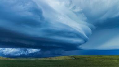 Dramatic dark storm clouds over farmland; Guymon, Oklahoma, United States of America