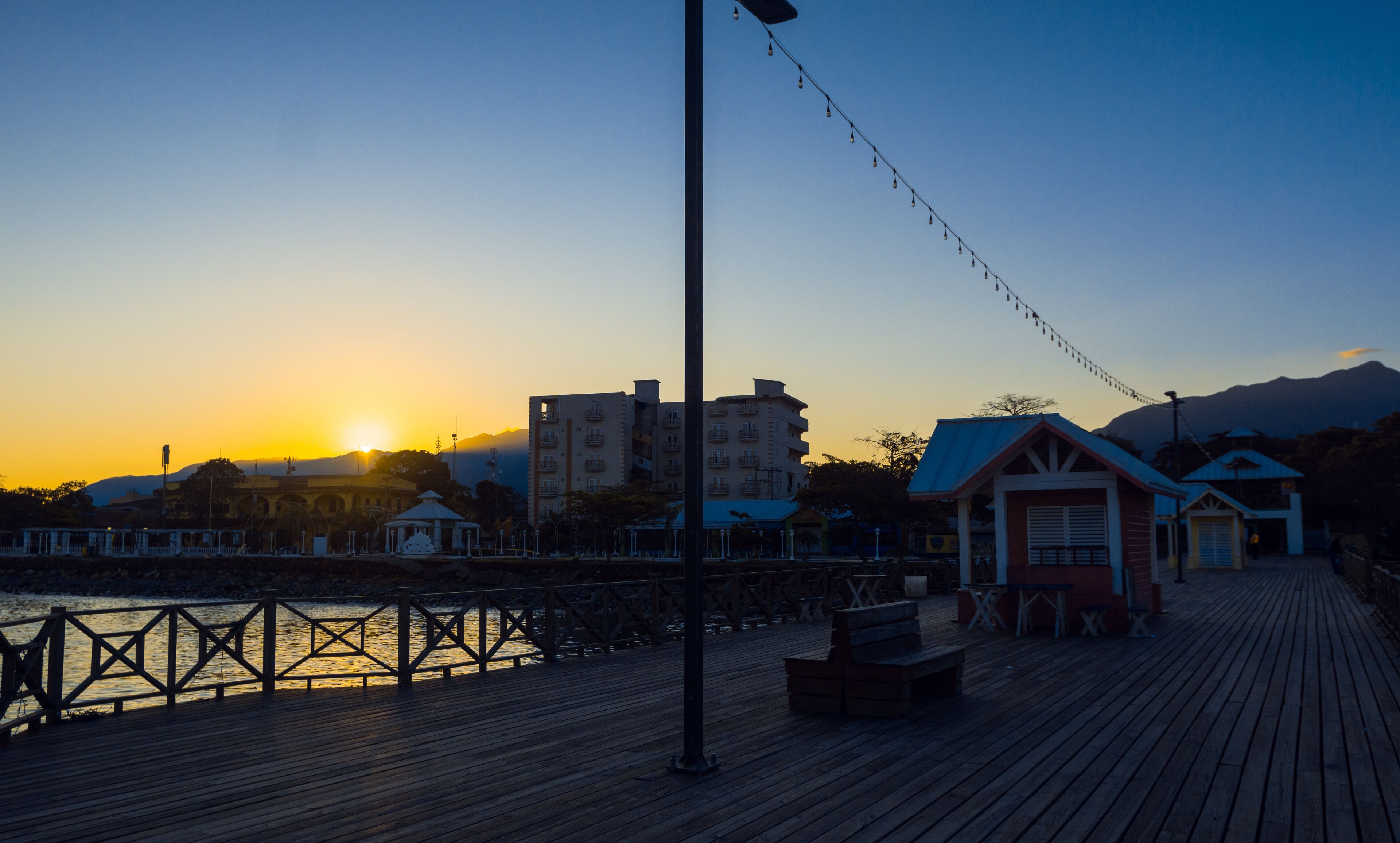 La Ceiba, Honduras Sunday in the morning, tourist pier, sunrise in the beach, blue color, tourism background,paradise, loneliness, without people, isolated.