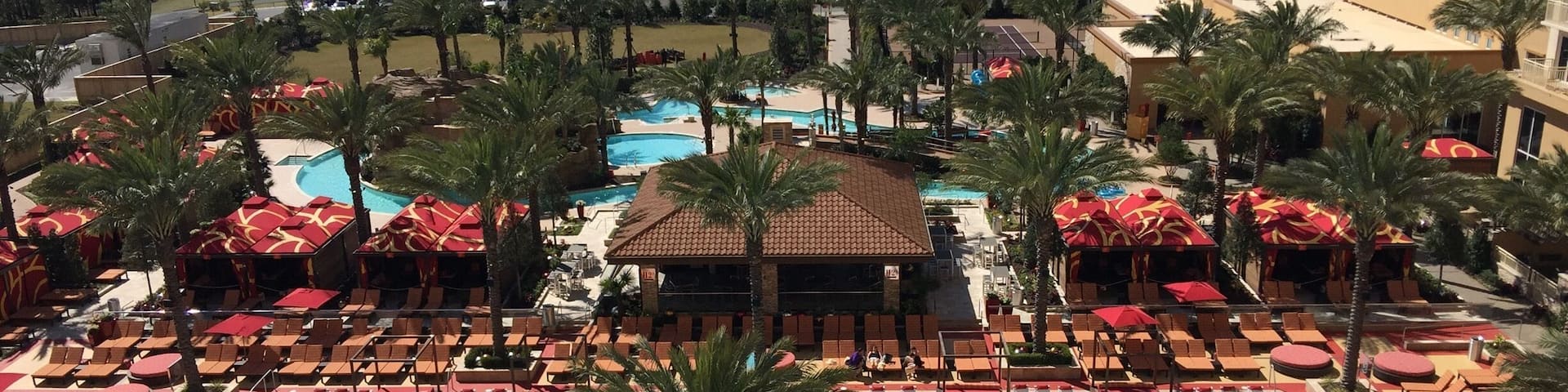 View of pool from hotel room balcony
