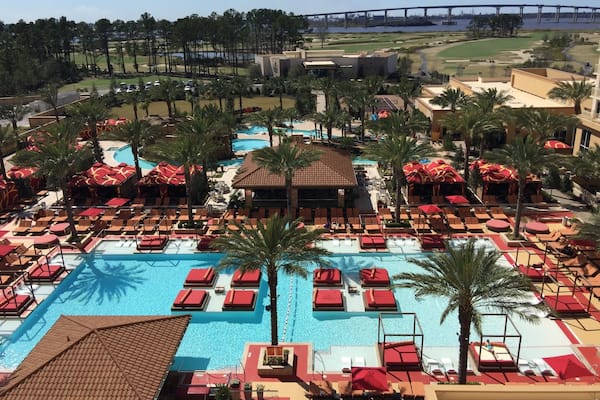 View of pool from hotel room balcony
