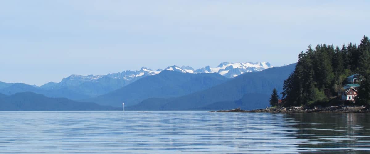 Heading out of Wrangell Alaska to go up the Stikine River , with Alaska Waters boat tours, to see Shakes Glacier. Stunning views. This was the beginning of August and the mountains still had snow on the tops.