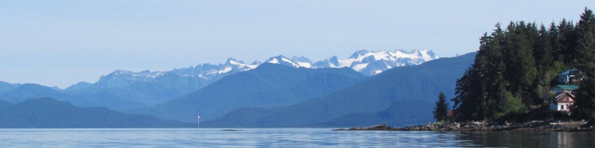Heading out of Wrangell Alaska to go up the Stikine River , with Alaska Waters boat tours, to see Shakes Glacier. Stunning views. This was the beginning of August and the mountains still had snow on the tops.