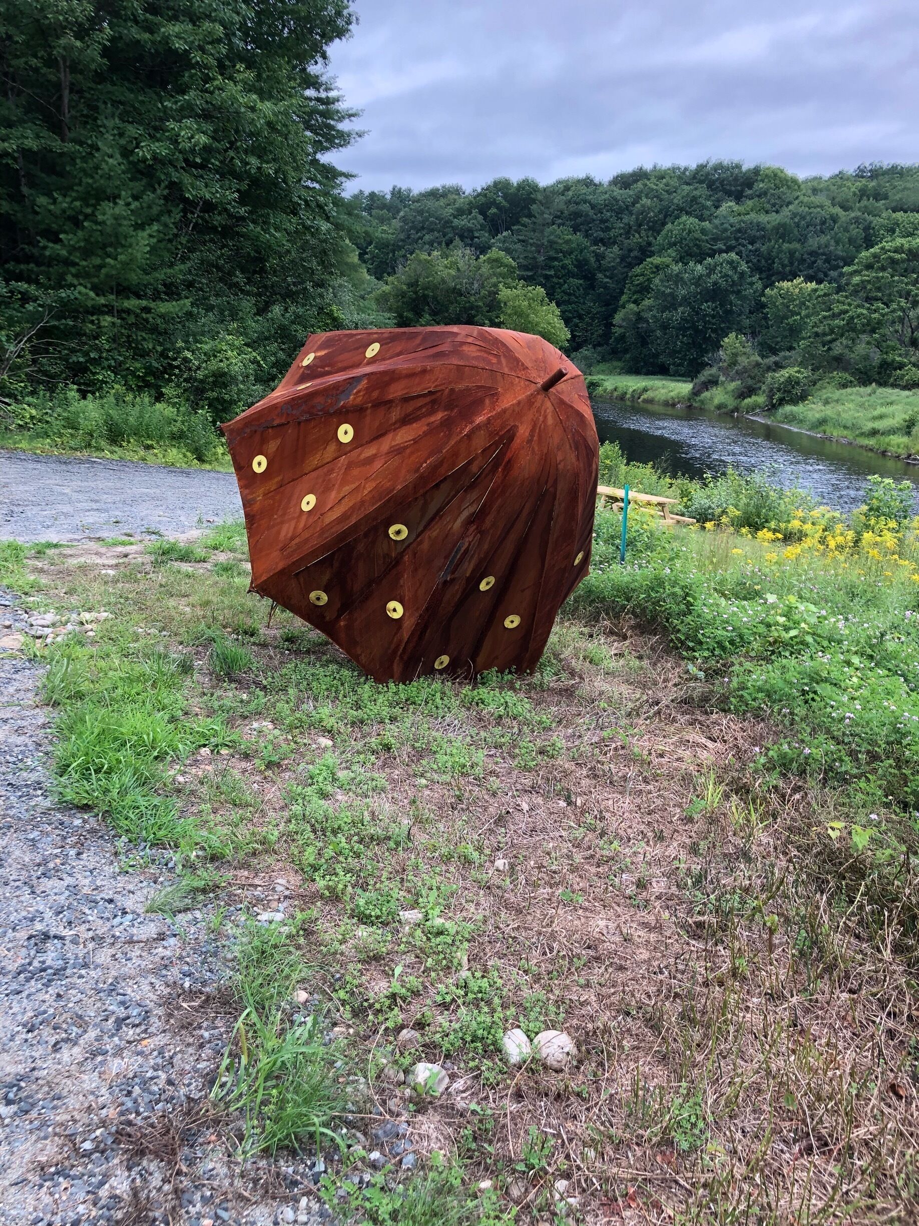 A whimsical over 5 ‘ high steel umbrella is artwork found along the rail trail. The Mascoma Valley Greenway runs from W. Lebanon, NH to downtown Lebanon, NH. following the the old rail line and intersecting with Mascoma River. The Northern Rail Trail continues from there for another 50 + miles to the south through some of NH’s most beautiful countryside. 