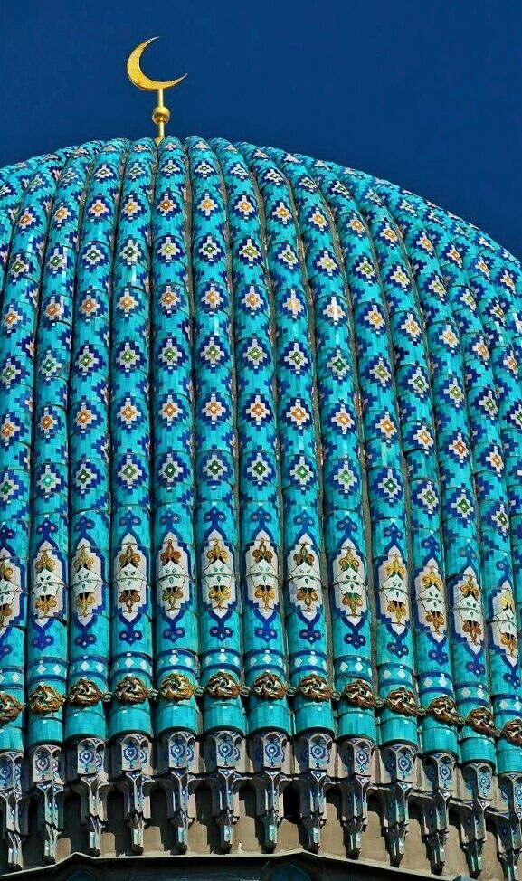 May 2011 
Dome of the St. Petersburg mosque which was built 1910-1921 by architect Nikolai Vasilyev resembling the the Gur-e Amir mosque in Samarkand, where the tomb of Tamerlane Sultan is located. Skylight azure blue ceramic tiles decorate both the dome and minarets. It is located opposite the Peter and Paul Fortress in the city center. It can accomodate 8.000 worshippers and is one of the northernmost mosques in the world. The dome is a near-replica of Gur-e Amir and the rest is actually Northern Art Nouveau popular in St. Petersburg and Finland. 