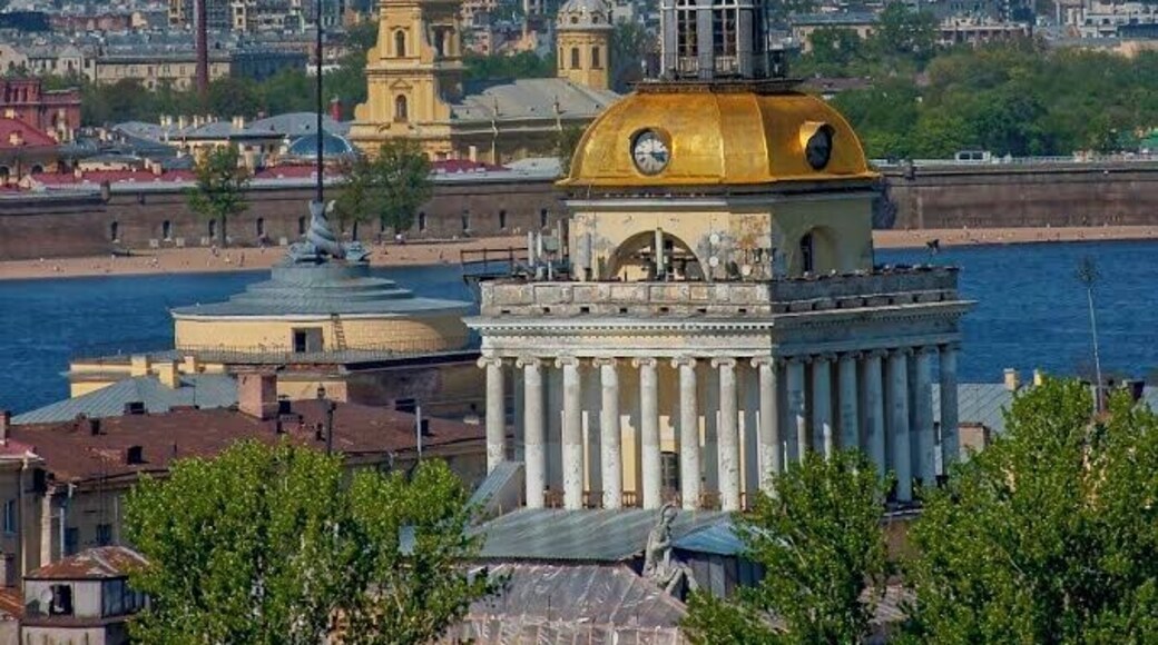 May 2011
Admiralty building, St. Petersburg, Russia
The dome spires are a trademark of Russian clasicisism architecture. The most famous in St. Petersburg is the tower spire of the Admiralty building from first half of 18th century. It is plated in gold and called the Admiralty needle. The Admiralty was founded in 1704 under the rule of the Tsar Peter the Great and it was the headquarters of the Emperor's Navy as well as the docks.
Across the Neva river you can see another mighty spire of the Peter and Paul Cathedral on the island with a fortress bearing the same name.
You can enjoy this view from the rooftop arcade of near St. Isaac's Cathedral.