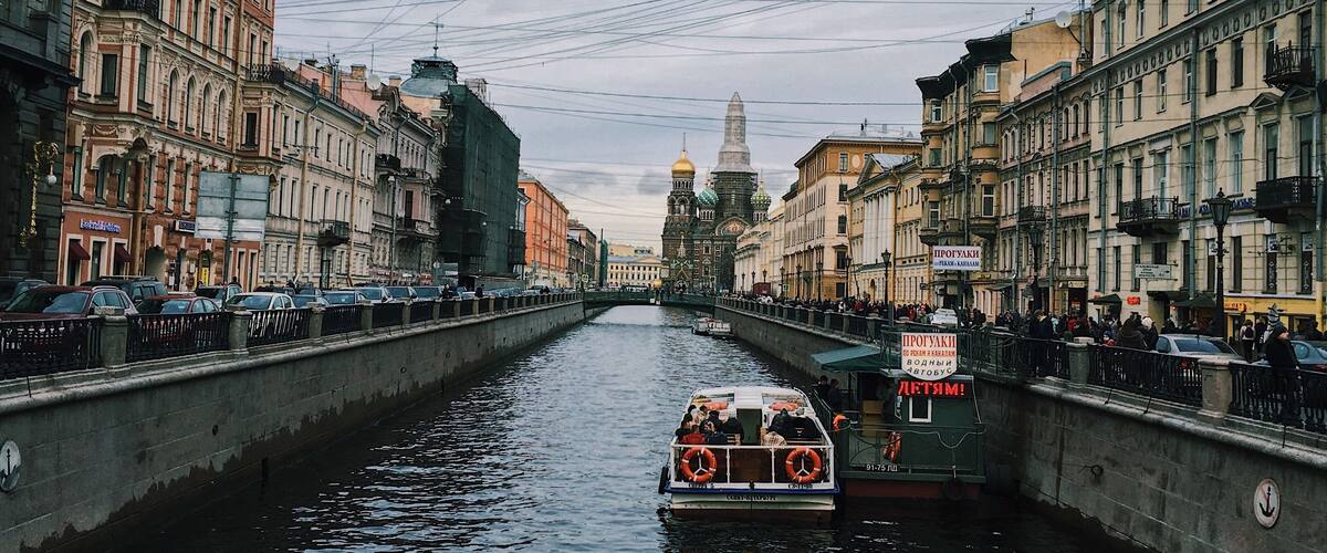 A river in St. Petersburg with a view of the Church of the Savior on Spilled Blood.
