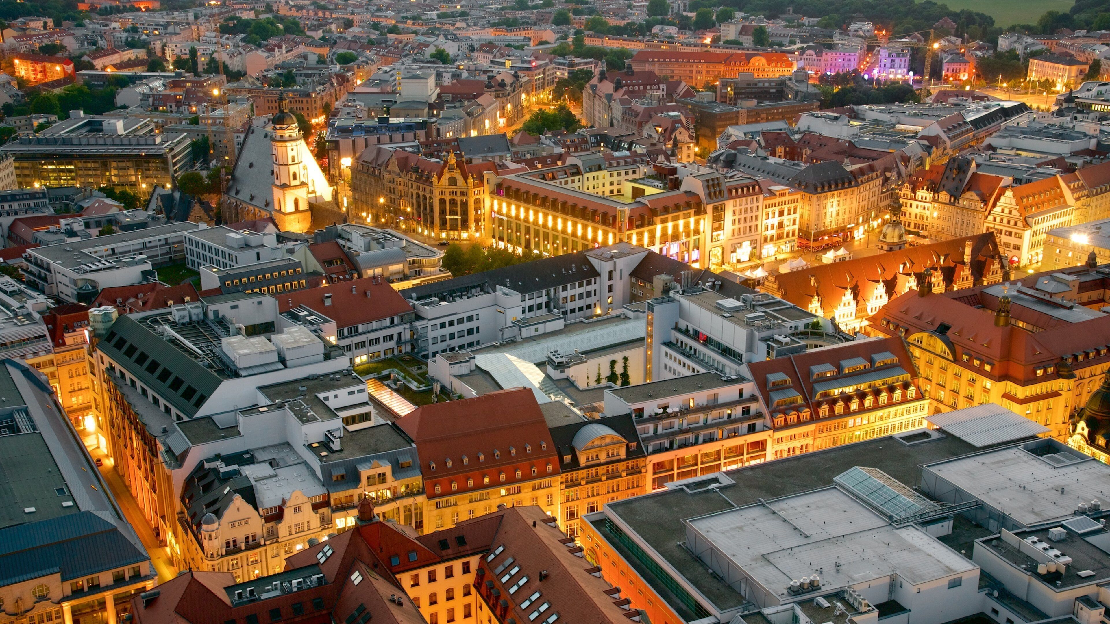Leipzig showing a city and night scenes