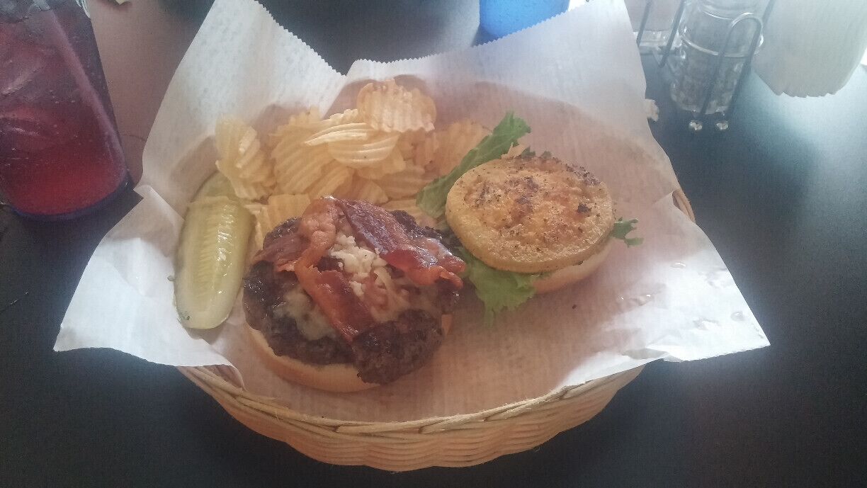 The revro burger from Stella's Kentucky Deli in Lexington - premium colcord farm beef, topped with a fried green tomato, bacon, jack cheese, basil mayo and lettuce. A sort of hidden place in what appears to be an old house. They also make their own specialty sodas with unique flavors such as lavender, geranium/rose and jalapeno. 