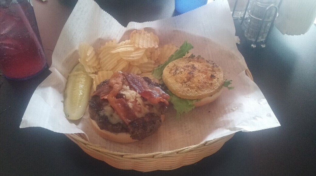 The revro burger from Stella's Kentucky Deli in Lexington - premium colcord farm beef, topped with a fried green tomato, bacon, jack cheese, basil mayo and lettuce. A sort of hidden place in what appears to be an old house. They also make their own specialty sodas with unique flavors such as lavender, geranium/rose and jalapeno.